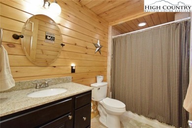 This is the cabin in the woods where you can envision your on Beech Mountain Club in North Carolina - for sale on GolfHomes.com, golf home, golf lot