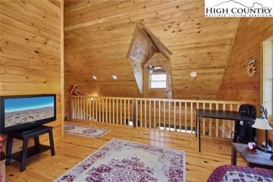 This is the cabin in the woods where you can envision your on Beech Mountain Club in North Carolina - for sale on GolfHomes.com, golf home, golf lot