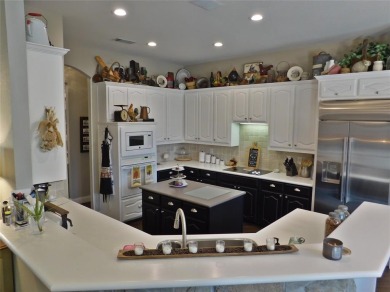 Elegant Living on an Oversized Corner Lot Beneath a Canopy of on Oakmont Country Club in Texas - for sale on GolfHomes.com, golf home, golf lot