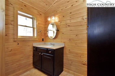 This is the cabin in the woods where you can envision your on Beech Mountain Club in North Carolina - for sale on GolfHomes.com, golf home, golf lot