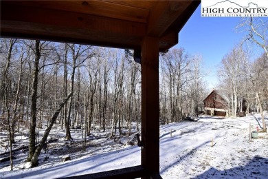 This is the cabin in the woods where you can envision your on Beech Mountain Club in North Carolina - for sale on GolfHomes.com, golf home, golf lot