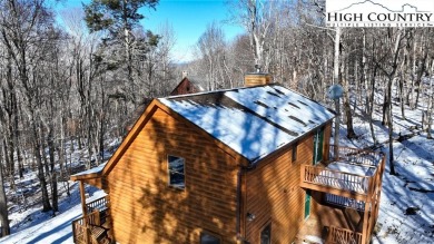 This is the cabin in the woods where you can envision your on Beech Mountain Club in North Carolina - for sale on GolfHomes.com, golf home, golf lot