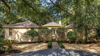 Classic and elegantly designed home with French provincial style on The Seabrook Island Club in South Carolina - for sale on GolfHomes.com, golf home, golf lot