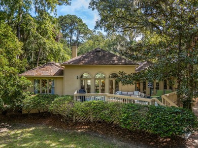 Classic and elegantly designed home with French provincial style on The Seabrook Island Club in South Carolina - for sale on GolfHomes.com, golf home, golf lot