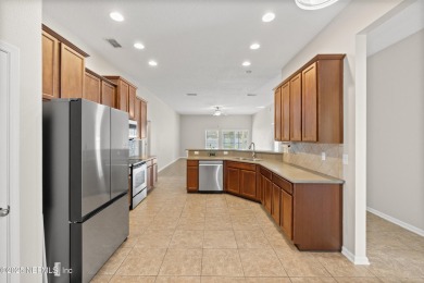 Gorgeous St Johns County saltwater pool home with 3 car garage on St. Johns Golf and Country Club in Florida - for sale on GolfHomes.com, golf home, golf lot