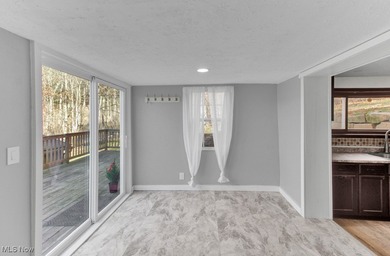 Welcome to this beautifully renovated 3-bedroom, 2-bath gem in on Lake Mohawk Golf Club in Ohio - for sale on GolfHomes.com, golf home, golf lot