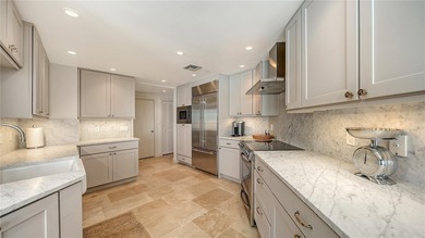 Positioned on the south side and sixth floor of The Promenade on on Links on Longboat Golf Club in Florida - for sale on GolfHomes.com, golf home, golf lot