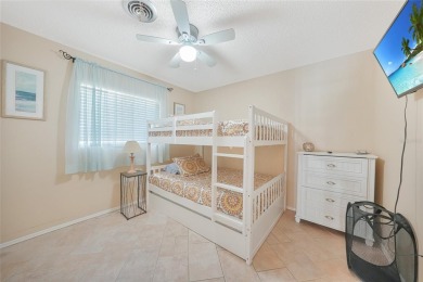Turn-key heated pool home, new roof (2023), X flood zone ideal on Oyster Creek Golf Club in Florida - for sale on GolfHomes.com, golf home, golf lot