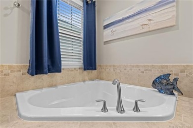 Discover the ideal combination of comfort and sophistication in on Colonial Heritage Golf Club in Virginia - for sale on GolfHomes.com, golf home, golf lot