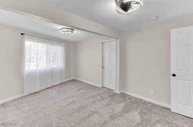 Welcome to this beautifully renovated 3-bedroom, 2-bath gem in on Lake Mohawk Golf Club in Ohio - for sale on GolfHomes.com, golf home, golf lot