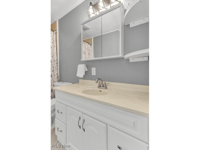 Welcome to this beautifully renovated 3-bedroom, 2-bath gem in on Lake Mohawk Golf Club in Ohio - for sale on GolfHomes.com, golf home, golf lot