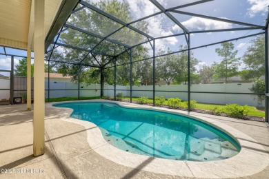 Gorgeous St Johns County saltwater pool home with 3 car garage on St. Johns Golf and Country Club in Florida - for sale on GolfHomes.com, golf home, golf lot