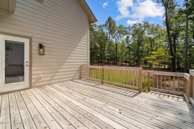 Welcome to 108 Winston Drive, an exquisite modern residence on Beacon Ridge Golf and Country Club in North Carolina - for sale on GolfHomes.com, golf home, golf lot