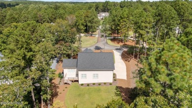 Welcome to 108 Winston Drive, an exquisite modern residence on Beacon Ridge Golf and Country Club in North Carolina - for sale on GolfHomes.com, golf home, golf lot