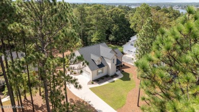 Welcome to 108 Winston Drive, an exquisite modern residence on Beacon Ridge Golf and Country Club in North Carolina - for sale on GolfHomes.com, golf home, golf lot