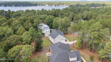 Welcome to 108 Winston Drive, an exquisite modern residence on Beacon Ridge Golf and Country Club in North Carolina - for sale on GolfHomes.com, golf home, golf lot