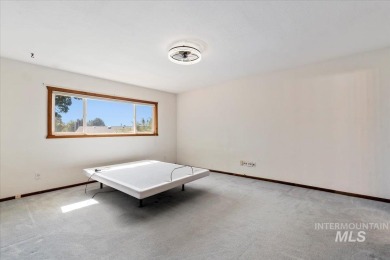 This classic split-level home offers plenty of space and on Indian Lakes Golf Course in Idaho - for sale on GolfHomes.com, golf home, golf lot
