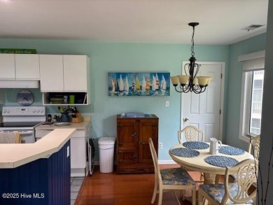 Unit # 8-C at Oyster Bay Plantation is a 2 bedroom, 2 bath condo on Oyster Bay Golf Links in North Carolina - for sale on GolfHomes.com, golf home, golf lot