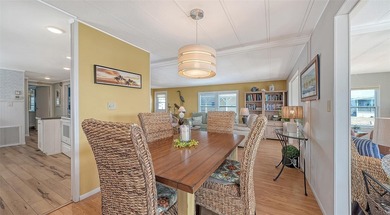 Welcome to Venice Isle, a highly sought-after 55+ mobile home on Pelican Pointe Golf and Country Club in Florida - for sale on GolfHomes.com, golf home, golf lot