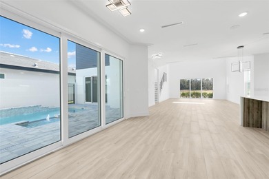 Wow! This custom courtyard pool and spa home on the 11th hole at on Providence Golf Club in Florida - for sale on GolfHomes.com, golf home, golf lot