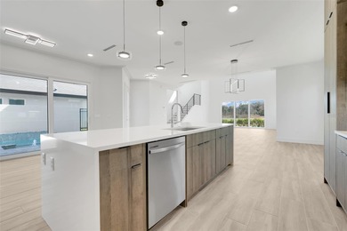 Wow! This custom courtyard pool and spa home on the 11th hole at on Providence Golf Club in Florida - for sale on GolfHomes.com, golf home, golf lot