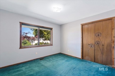 This classic split-level home offers plenty of space and on Indian Lakes Golf Course in Idaho - for sale on GolfHomes.com, golf home, golf lot