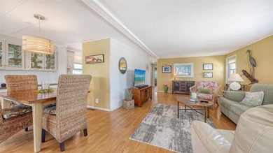 Welcome to Venice Isle, a highly sought-after 55+ mobile home on Pelican Pointe Golf and Country Club in Florida - for sale on GolfHomes.com, golf home, golf lot