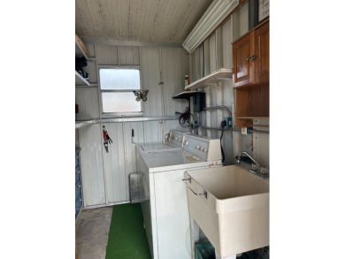 COME AND GRAB THIS DEAL OF A HOME IN THE VERY DESIRABLE ODESSA on Silver Dollar Golf and Trap Club in Florida - for sale on GolfHomes.com, golf home, golf lot