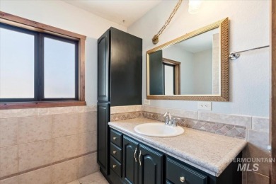This classic split-level home offers plenty of space and on Indian Lakes Golf Course in Idaho - for sale on GolfHomes.com, golf home, golf lot