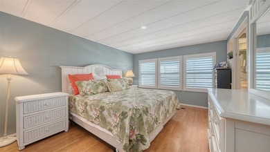 Welcome to Venice Isle, a highly sought-after 55+ mobile home on Pelican Pointe Golf and Country Club in Florida - for sale on GolfHomes.com, golf home, golf lot