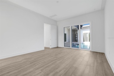 Wow! This custom courtyard pool and spa home on the 11th hole at on Providence Golf Club in Florida - for sale on GolfHomes.com, golf home, golf lot