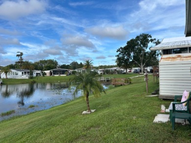 COME AND GRAB THIS DEAL OF A HOME IN THE VERY DESIRABLE ODESSA on Silver Dollar Golf and Trap Club in Florida - for sale on GolfHomes.com, golf home, golf lot