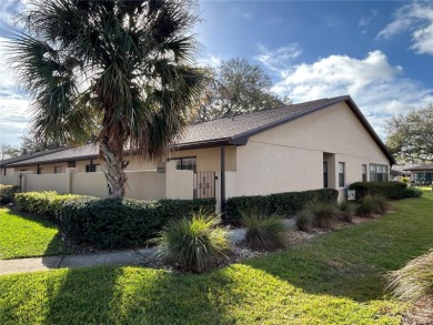 This well maintained 2 bedroom 2 bathroom golf villa features on Cypresswood Golf and Country Club in Florida - for sale on GolfHomes.com, golf home, golf lot