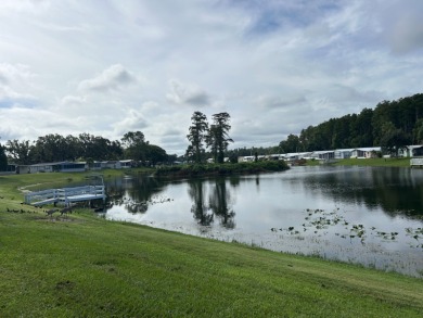 COME AND GRAB THIS DEAL OF A HOME IN THE VERY DESIRABLE ODESSA on Silver Dollar Golf and Trap Club in Florida - for sale on GolfHomes.com, golf home, golf lot