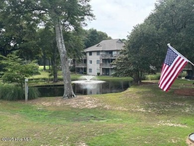 Unit # 8-C at Oyster Bay Plantation is a 2 bedroom, 2 bath condo on Oyster Bay Golf Links in North Carolina - for sale on GolfHomes.com, golf home, golf lot