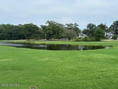 Unit # 8-C at Oyster Bay Plantation is a 2 bedroom, 2 bath condo on Oyster Bay Golf Links in North Carolina - for sale on GolfHomes.com, golf home, golf lot