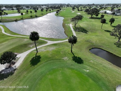 GOLF COURSE VIEW!! That's what this home is about, as well as on Barefoot Bay Golf Course in Florida - for sale on GolfHomes.com, golf home, golf lot