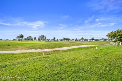GOLF COURSE VIEW!! That's what this home is about, as well as on Barefoot Bay Golf Course in Florida - for sale on GolfHomes.com, golf home, golf lot