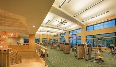 A new, contemporary 11,000 sf waterfront home is under on Sailfish Point Golf Club, Inc. in Florida - for sale on GolfHomes.com, golf home, golf lot