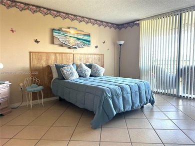 Enjoy easy and comfortable living in this bright 1-bedroom, 1 on Pembroke Lakes Golf Club in Florida - for sale on GolfHomes.com, golf home, golf lot