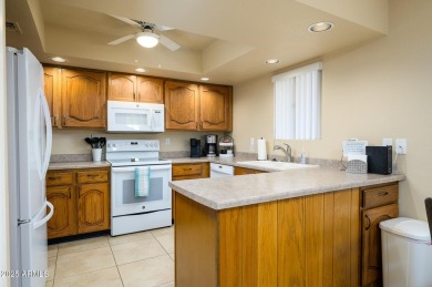 Perfectly placed, fourth floor condo with premium pool view from on Stonecreek Golf Club in Arizona - for sale on GolfHomes.com, golf home, golf lot