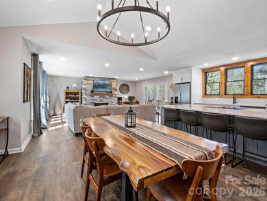 This recently renovated home with an open concept living space on Rumbling Bald Resort on Lake Lure in North Carolina - for sale on GolfHomes.com, golf home, golf lot