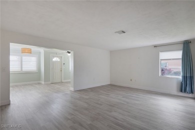 NEW LUXURY VINYL FLOORING throughout the home. Refurbished on Whiskey Creek Country Club in Florida - for sale on GolfHomes.com, golf home, golf lot