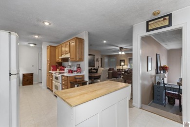 Charming 3 BR, 2 BA home located in the city limits of Kuttawa! on Mineral Mound Golf Course in Kentucky - for sale on GolfHomes.com, golf home, golf lot