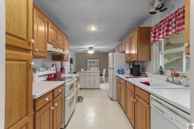 Charming 3 BR, 2 BA home located in the city limits of Kuttawa! on Mineral Mound Golf Course in Kentucky - for sale on GolfHomes.com, golf home, golf lot
