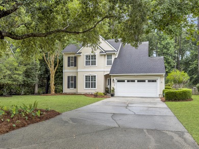 Inviting 3-bedroom, 2.5-bath home on a beautifully landscaped on Charleston National Golf Club in South Carolina - for sale on GolfHomes.com, golf home, golf lot