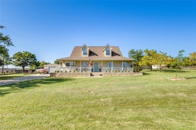 Stunning home, remodeled in 2023, situated on a .684 acre lot on Lake Kiowa Golf Course in Texas - for sale on GolfHomes.com, golf home, golf lot