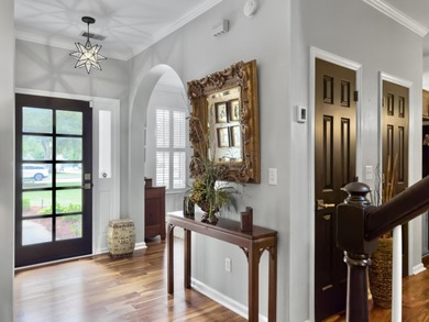 Inviting 3-bedroom, 2.5-bath home on a beautifully landscaped on Charleston National Golf Club in South Carolina - for sale on GolfHomes.com, golf home, golf lot