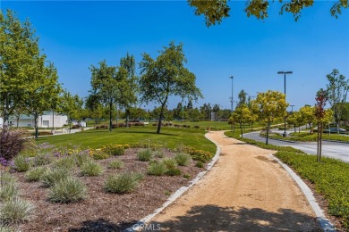 Nestled within the gated community of Fountain Park in the on David L. Baker Memorial Golf Course in California - for sale on GolfHomes.com, golf home, golf lot