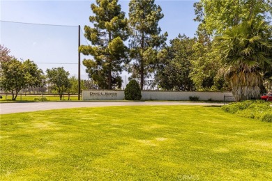 Nestled within the gated community of Fountain Park in the on David L. Baker Memorial Golf Course in California - for sale on GolfHomes.com, golf home, golf lot
